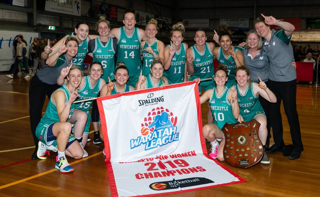 MISSION COMPLETE: Newcastle Hunters celebrate after winning the Waratah Basketball League women's championship. Narelle Spangher (Basketball NSW)