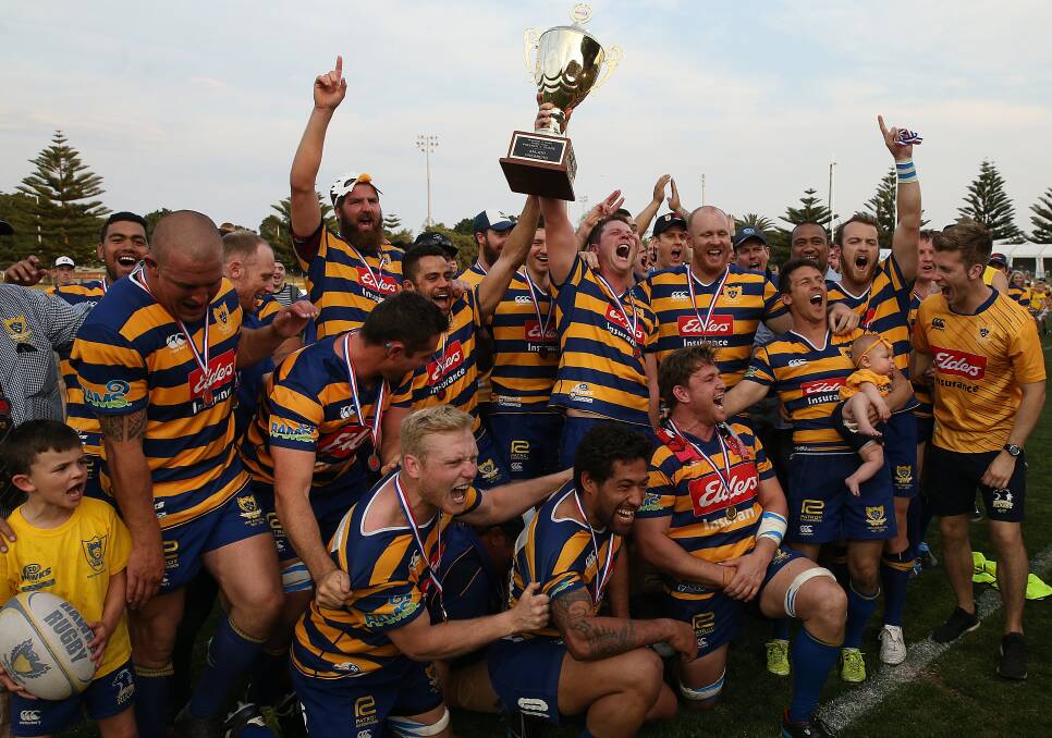 WINNERS ARE GRINNERS: Hamilton celebrate their 45-12 triumph over Wanderers in the Newcastle and Hunter Rugby Union grand final at No.2 Sportsground on Saturday. Picture: Marina Neil