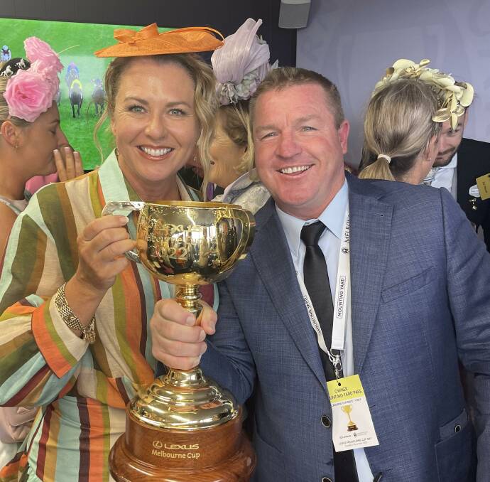 Kelli and Tony Price with the coveted Melbourne Cup after Gold Trip's win. Picture Supplied