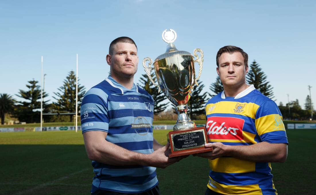 WHO DARES WINS: Rival captains Ben Ham (Wanderers) and Steve Lamont (Hamilton) with the premiership trophy. Picture: Max Mason-Hubers