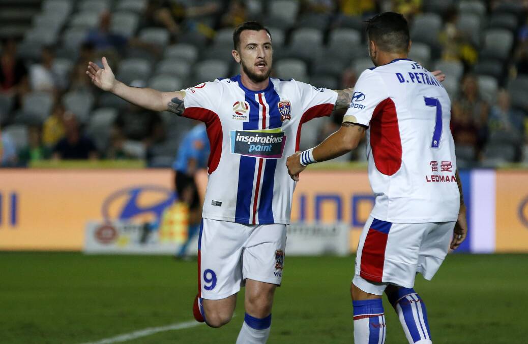 STRIKING BACK: Striker Roy O'Donovan celebrates his first-half goal in the Jets' 8-2 win over the Central Coast Mariners in Gosford  on Saturday night. Picture: Darren Pateman (AAP)
