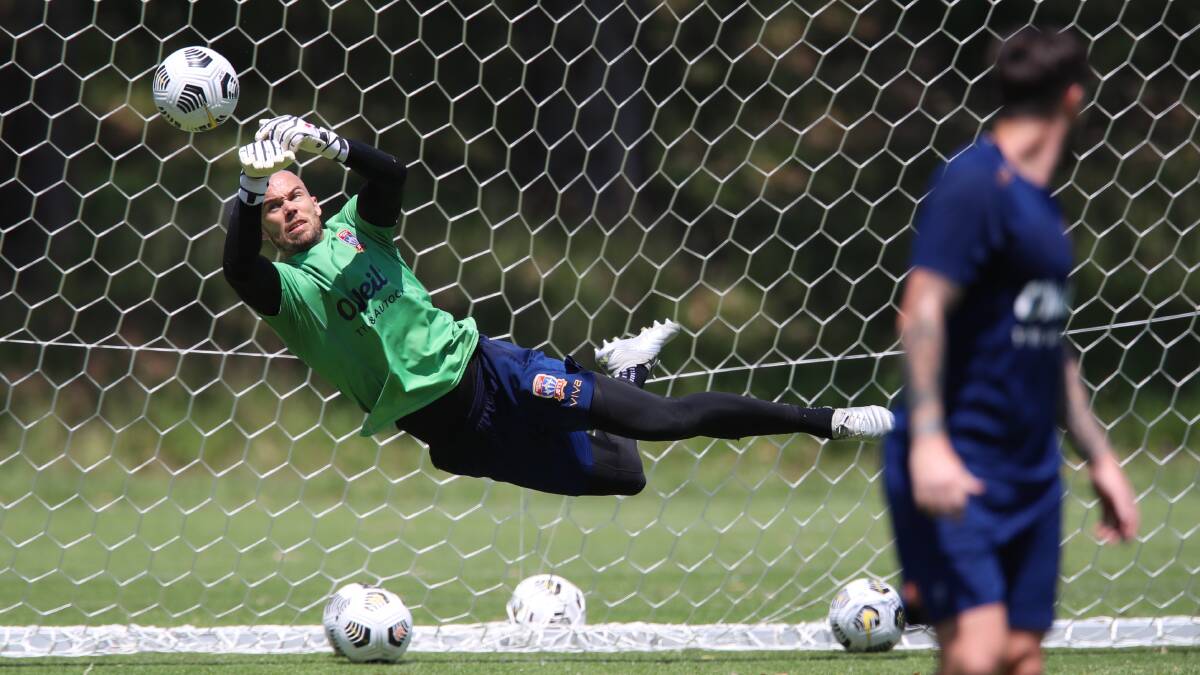 HE'S A KEEPER: Jack Duncan dives full stretch at Jets training. Picture: Sproule Sports Focus