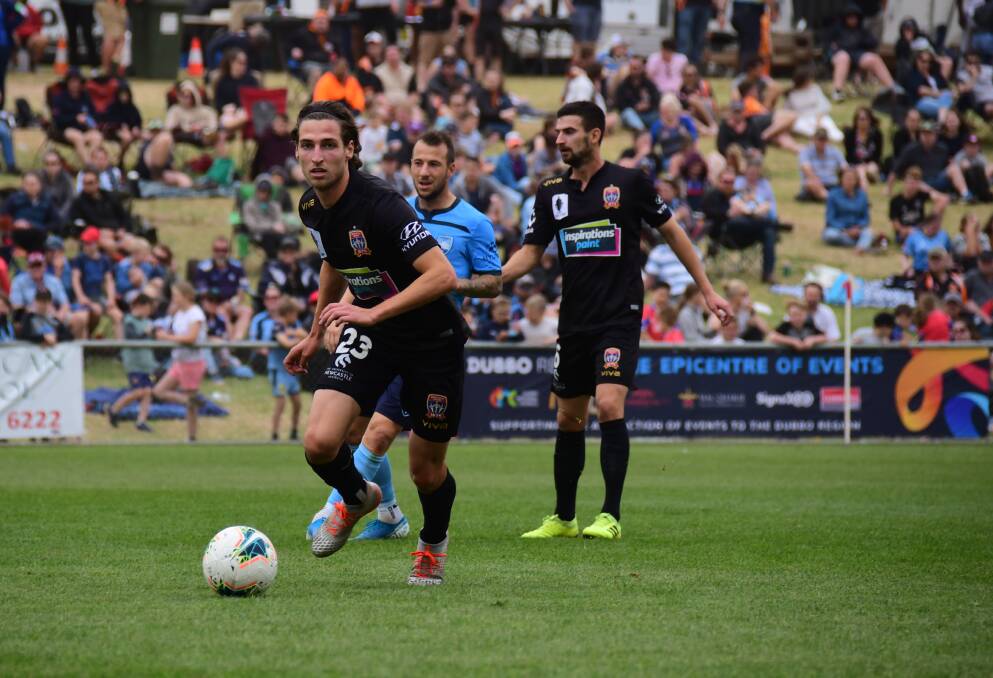 ON THE BALL: Jets midfielder Matthew Ridenton looks for option in the scoreless draw with Sydney FC at Apex Oval Dubbo on Saturday. Picture: Amy McIntyre
