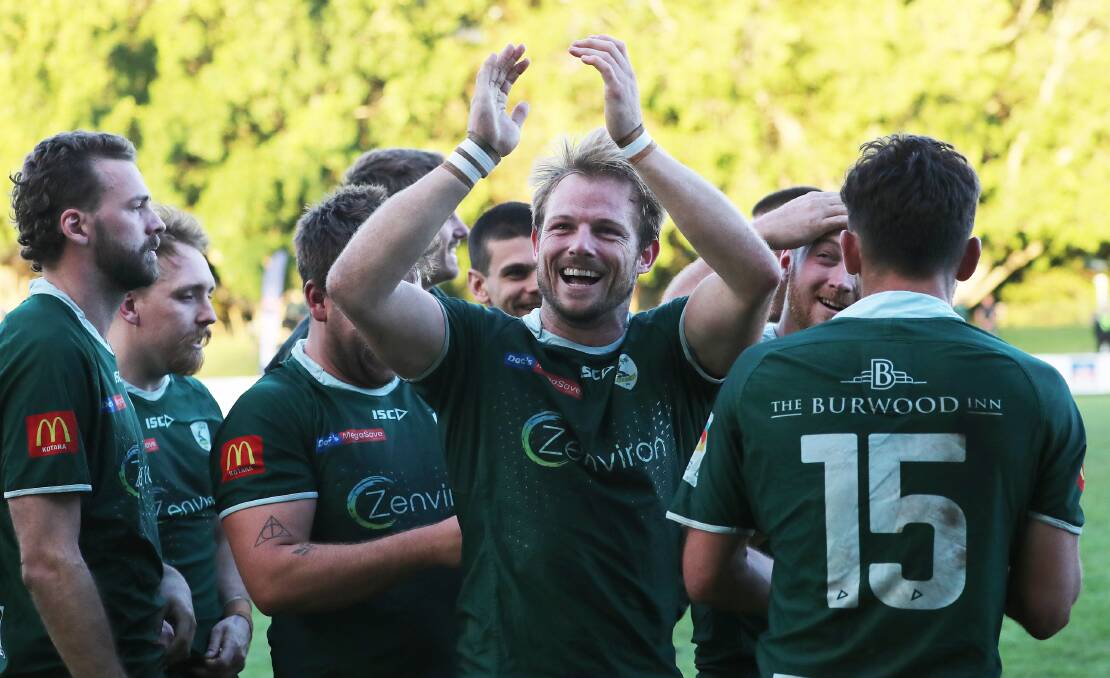 Merewether fly-half celebrates after kicking the Greens to victory over Hamilton. Picture by Peter Lorimer