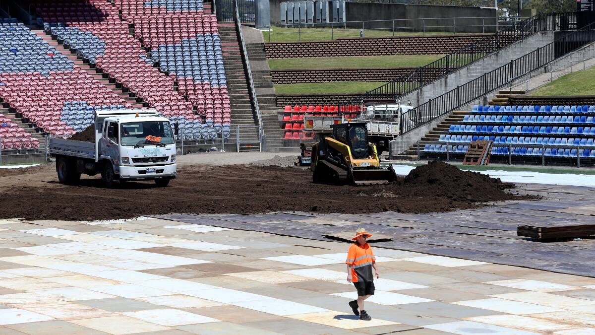 Preparations for the Australian Supercross Championship at McDonald Jones Stadium last year. Picture by Peter Lorimer