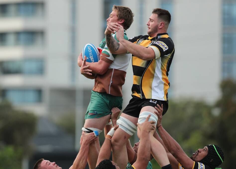 STEAL: Lachy Miller gets up in front of his Penrith opponent to win a lineout.