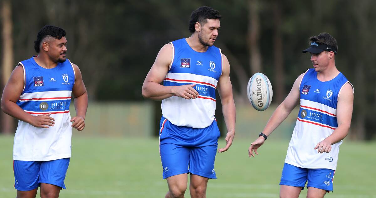 HIGH HOPES: Hunter Wildfires fullback Will Feeney (right) at pre-season training on Monday. Picture: Peter Lorimer