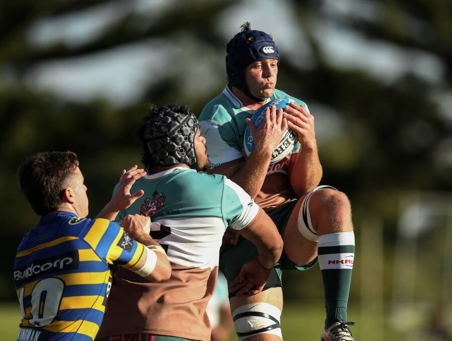 MUSCLE UP: South African-born breakaway Shawn Ingle claims a bomb against Sydney University. The Wildfires take on Manly in Manly on Saturday. Picture: Marina Neil