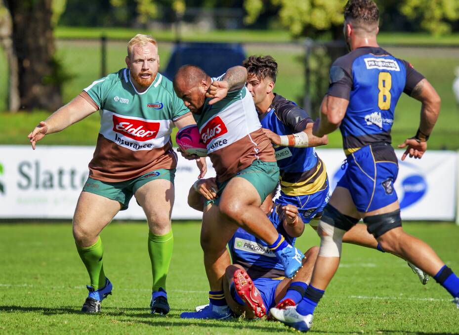 ON THE CHARGE: Newcastle hooker Chris Ale breaks a tackle against the Western Force at No.2 Sportsground in February. Picture: Stewart Hazell