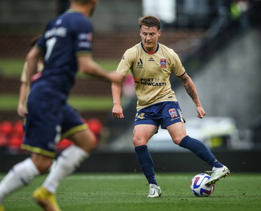 Left fulback James McGarry produces some fancy footwork before putting the Jets ahead in their 3-1 triumph over wellington Phoenix at McDonald Jones Stadium on Saturday. Pictures by Marina Neil