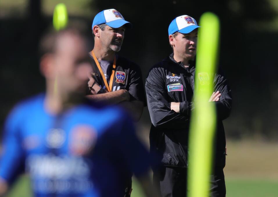BRAINS TRUST: Craig Deans and new assistant coach Karl Dodd at Jets training on Monday. Picture: Sproule Sports Focus