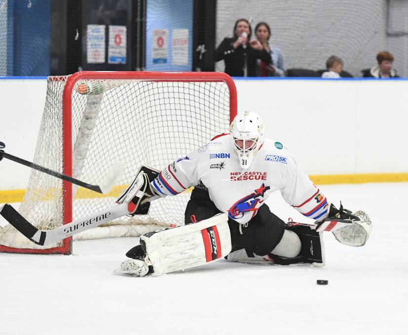 BRICK WALL: Newcastle Northstars goaltender Charlie Smart drops to block a shot against the Ice Dogs in their last encounter. Picture: PowerPlay Photographics.