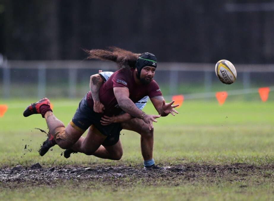 TOUGH SLOG: Lake Macquarie lock Mika Iopa gets a pass away during the Roos' 31-12 loss to Nelson Bay at Walters Park on Saturday. Picture: Jonathan Carroll