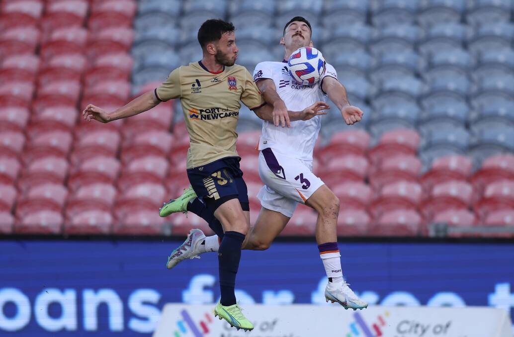 Jacob Dowse chests the ball down in front of Newcastle defender Thomas Aquilina in the 2-all draw last Saturday. Dowse is expected to join the Jets on a two-year deal, starting next season. Picture Getty Images