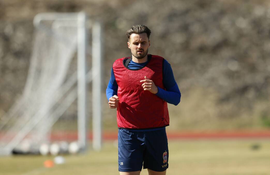 UP AND RUNNING: Former Arsenal and West Ham United defender Carl Jenkinson on the track at Jets training on Wesdnesday. Picture: Jonathan Carroll
