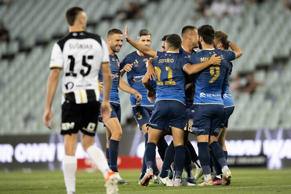 Newcastle Jets celebrate after Trent Buhagiar scored what proved the match-winner against Macarthur at Campbelltown Stadium on Saturday. Picture Getty Images