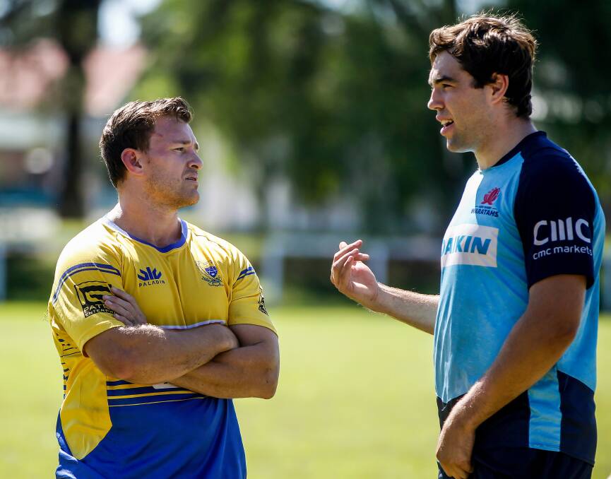 MATE AGAINST MATE: Former teammates Steve Lamont and Nick Palmer during a coaching clinic the then NSW Waratahs lock conducted in 2018. They will meet head on when the Wildfires tackle Northern Suburbs on Saturday. Picture: Jonathan Carroll 