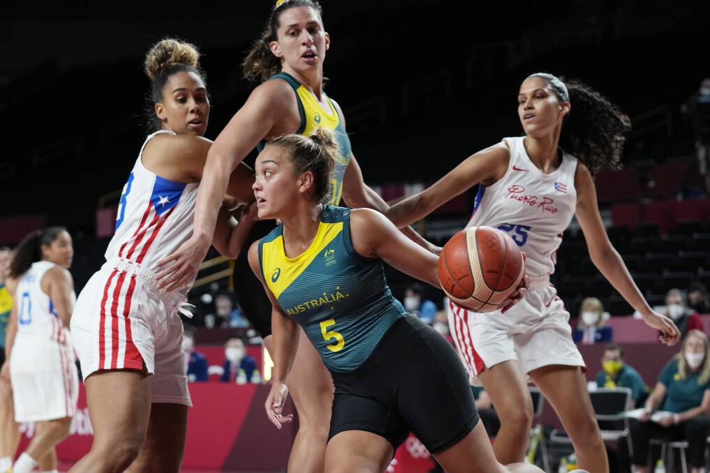 SPARK:Leilani Mitchell drives to the hoop in the Opals' 96-69 win over Puerto Rico. Picture: AAP 