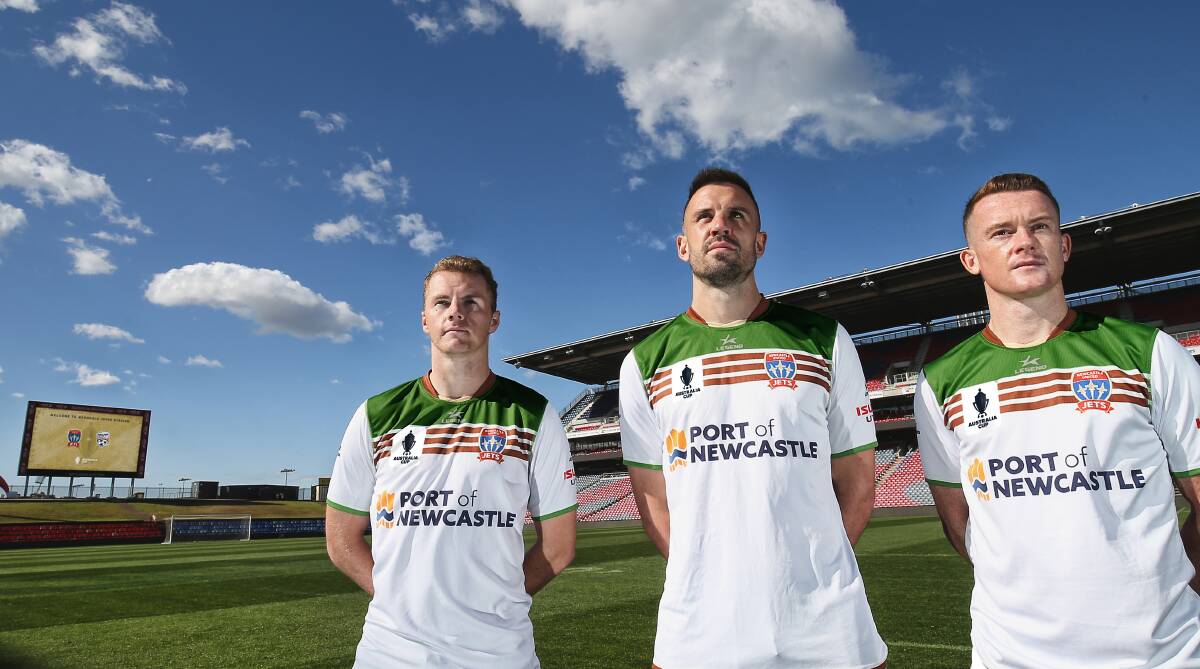 BACK TO THE FUTURE: Jets Trent Buhagiar, Matt Jurman and Brandon O'Neill in the KB United retro kits they will where against Adelaide in the Australia Cup at McDonald Jones Stadium on Saturday. Picture: Jets media