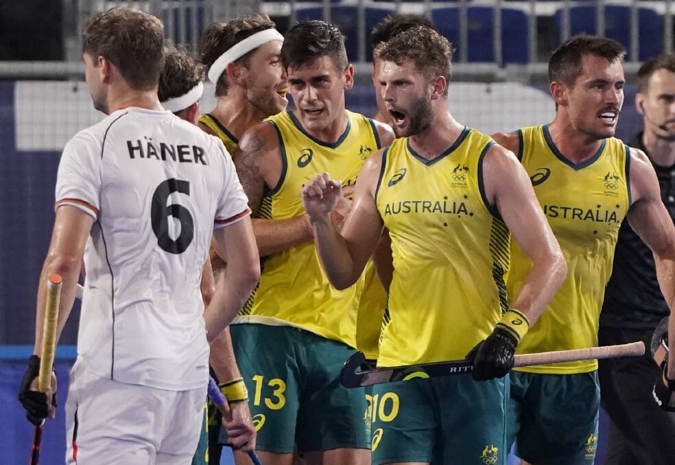GOING FOR GOLD: The Kookaburras celebrate after Blake Govers (13) scored against Germany in Australia's 3-1 win over Germany in the semi-final. Picture: AAP