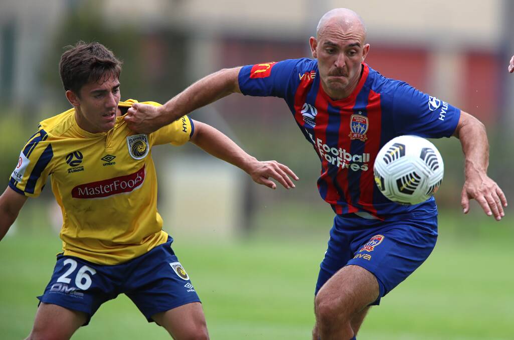 ON THE BALL: Jets midfielder Ben Kantarovski wins possession in the 2-0 loss to the Mariners in a friendly on Friday.Picture: Sproule Sports Focus