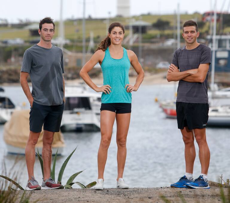 HI HOPES: Aaron Royle (right) with Australian triathlon teammates Jake Birthwhistle and Ashleigh Gentle at Wollongong harbour. Picture: Adam McLean