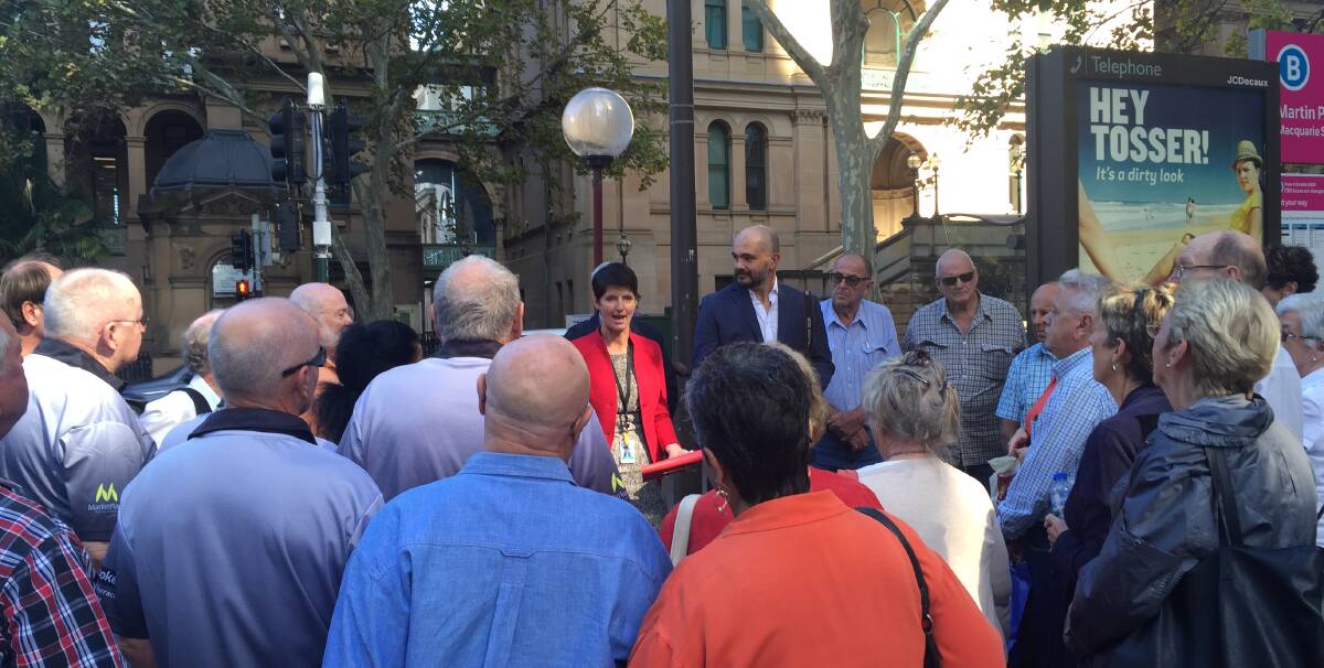 RALLYING THE TROOPS: Port Stephens MP Kate Washington addresses the residents who traveled to Sydney on a council-organised bus for a debate on the proposed merger in parliament on Wednesday.
