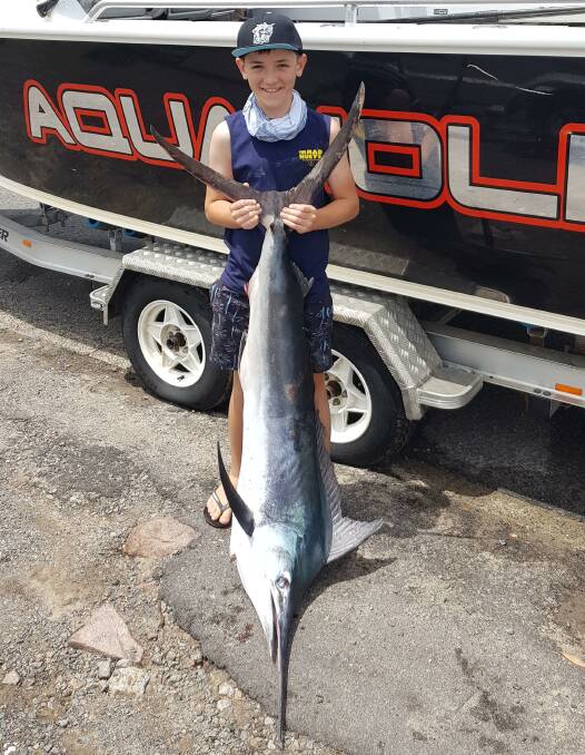 FISH OF THE WEEK: Tyler Carney, 12, from East Maitland wins a $45 voucher from Sandgate Tackle Power for this 25kg black marlin caught off Port Stephens on Sunday.