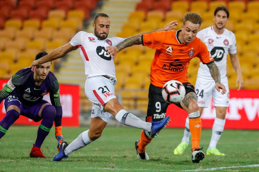 GONE: Brisbane and former Newcastle Jets striker Adam Taggart in action for Roar against Western Sydney Wanderers. Picture: AAP