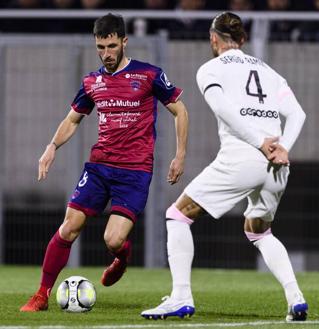 Jason Berthomier playing for Clermont against Paris Saint Germain star Sergio Ramos during a Ligue 1 game at Stade Gabriel Montpied on April 9, 2022. Picture by Marcio Machado, Eurasia Sport Images, Getty Images
