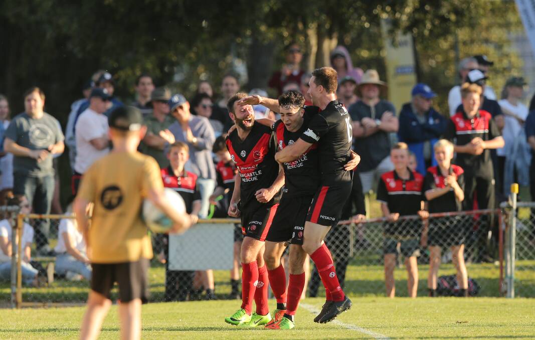 FAN POWER: Edgeworth celebrate a Daniel Fabrizio goal in their 2-0 NNSW NPL grand final victory over Maitland last year at Magic Park. Picture: Max Mason-Hubers