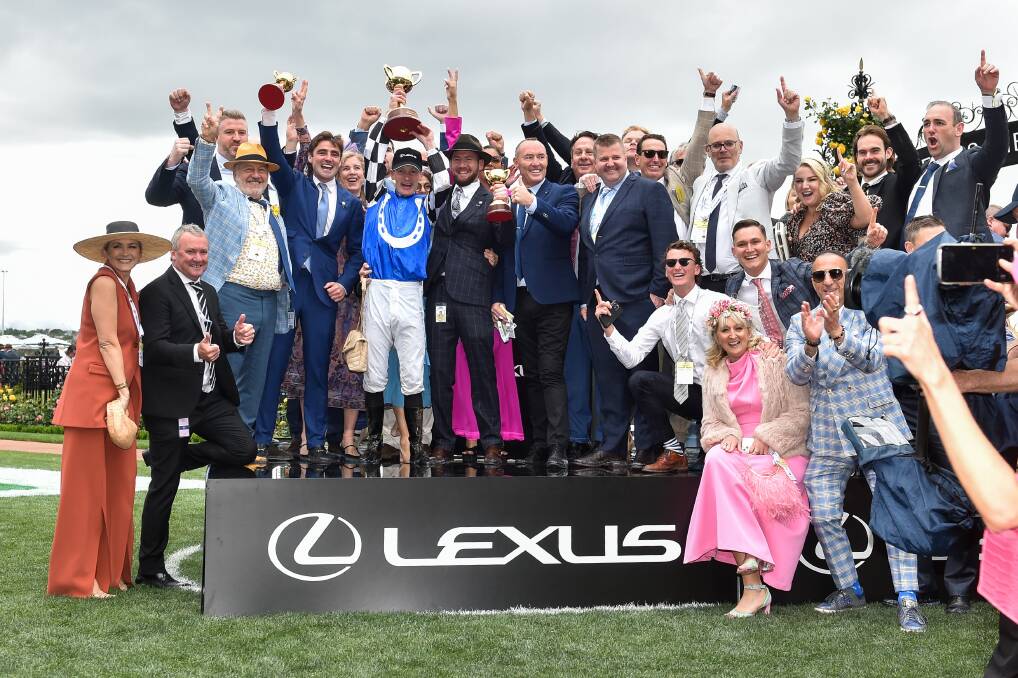 Connections enjoy their Melbourne Cup success with Gold Trip on Tuesday at Flemington. Picture Getty Images