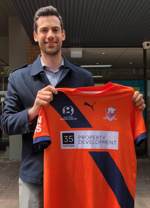 SIGNED: Top goalkeeper Danny Ireland with a Valentine jersey. 