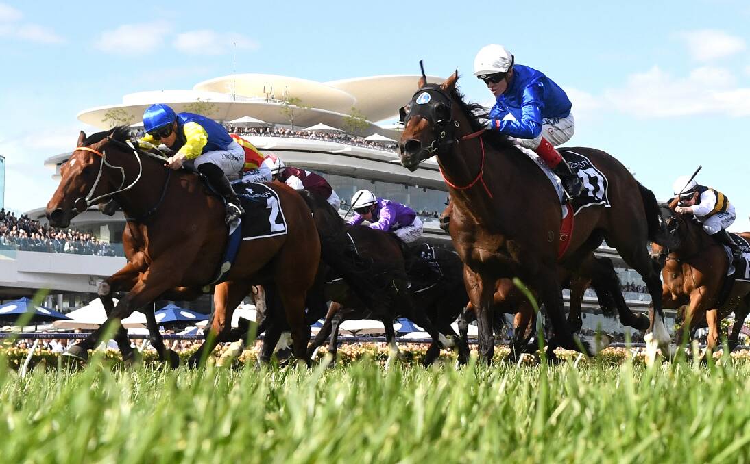 IN THE HUNT: The Kris Lees-trained Le Romain, left, finishes a half-length second to Best Of Days in the group 1 Cantala Stakes last November at Flemington over the mile. Picture: AAP Image/Hamish Blair