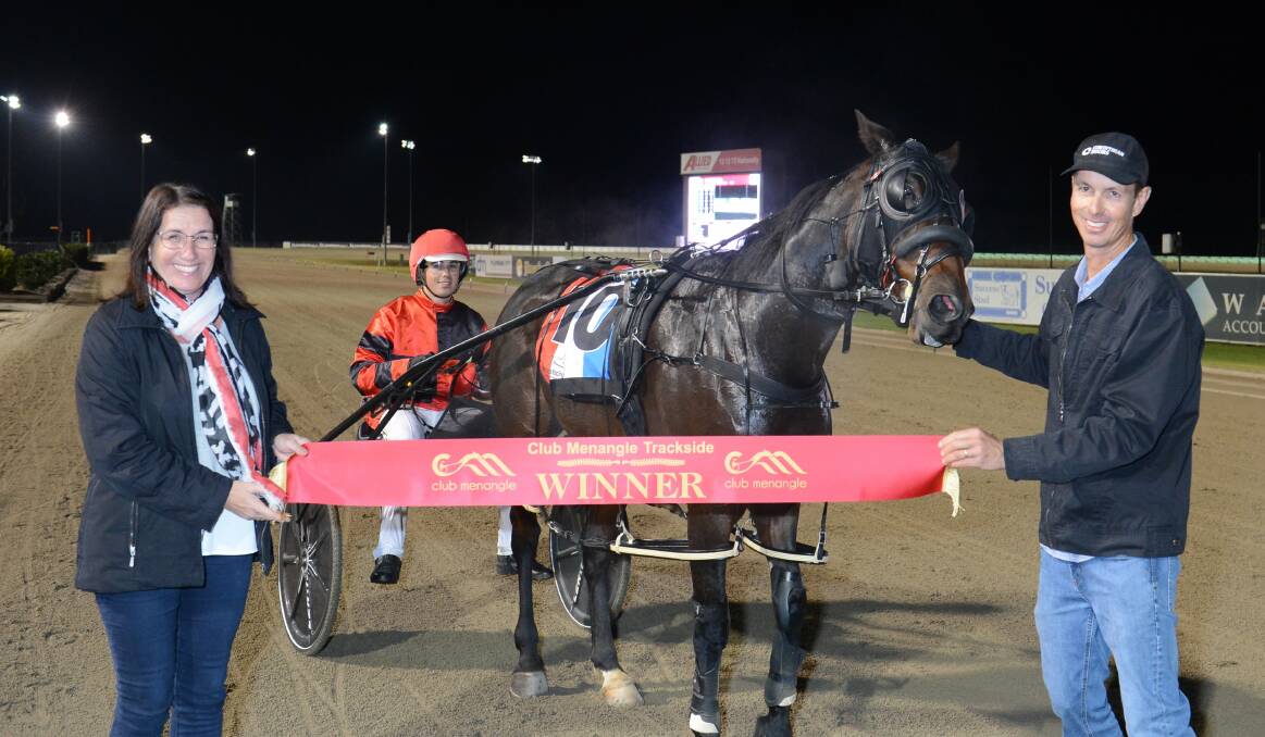 BIG NIGHT: Jack Callaghan returns a winner to parents Simone and Mark with Royal Gamble at Menangle. Picture: Racing at Club Menangle Trackside