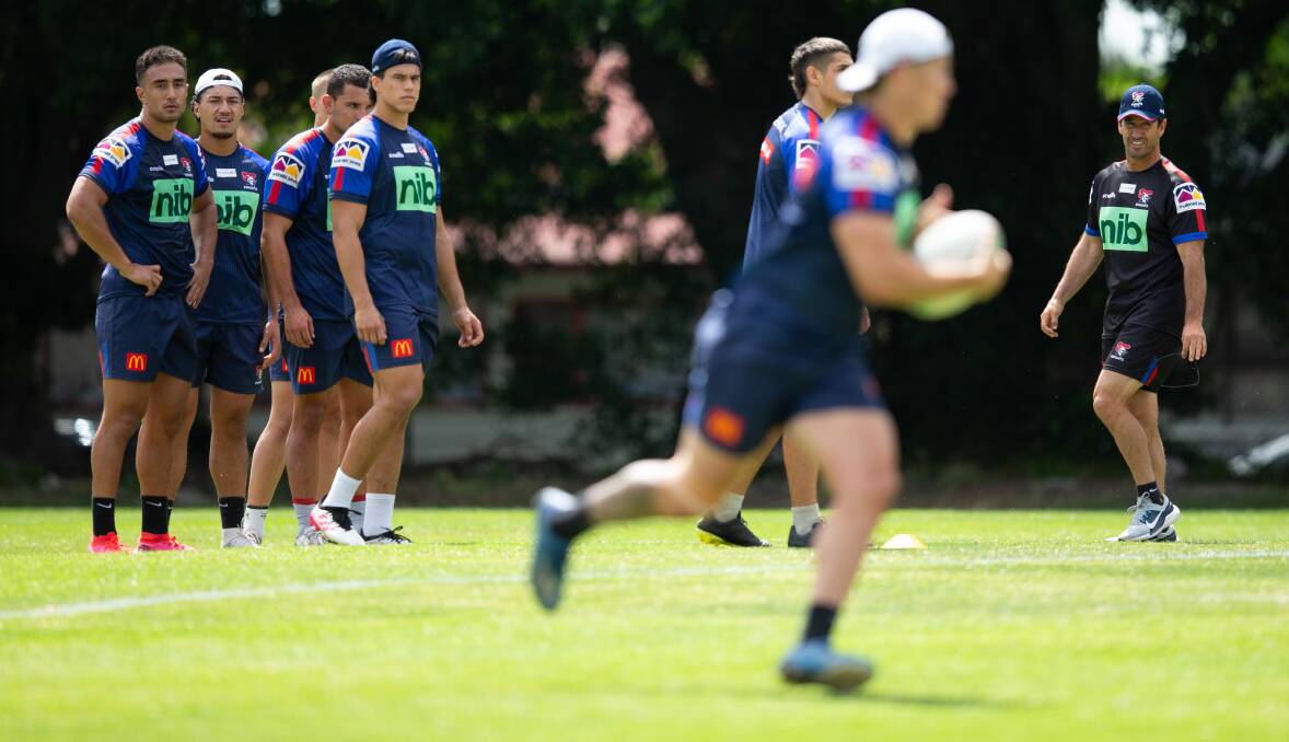 KEEN EYE: Club legend Andrew Johns, right, oversees a group at Newcastle Knights training on Tuesday at Balance Mayfield. Johns has returned to the club as a coaching consultant, working on Mondays and Tuesdays. Picture: Marina Neil