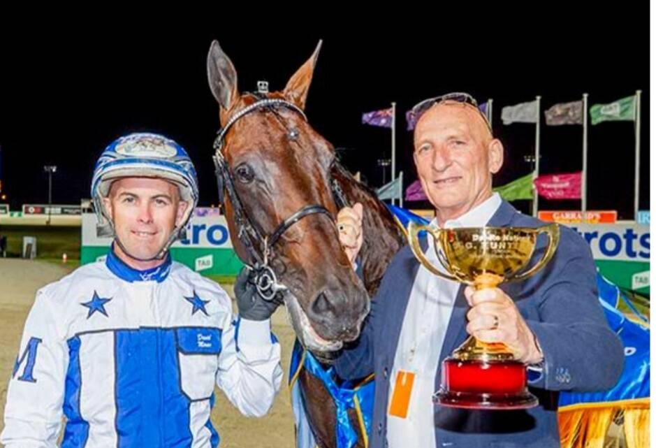 CUP KINGS: Kevin Gordon, right, with trainer-driver David Moran and Lochinvar Art on Saturday night. 