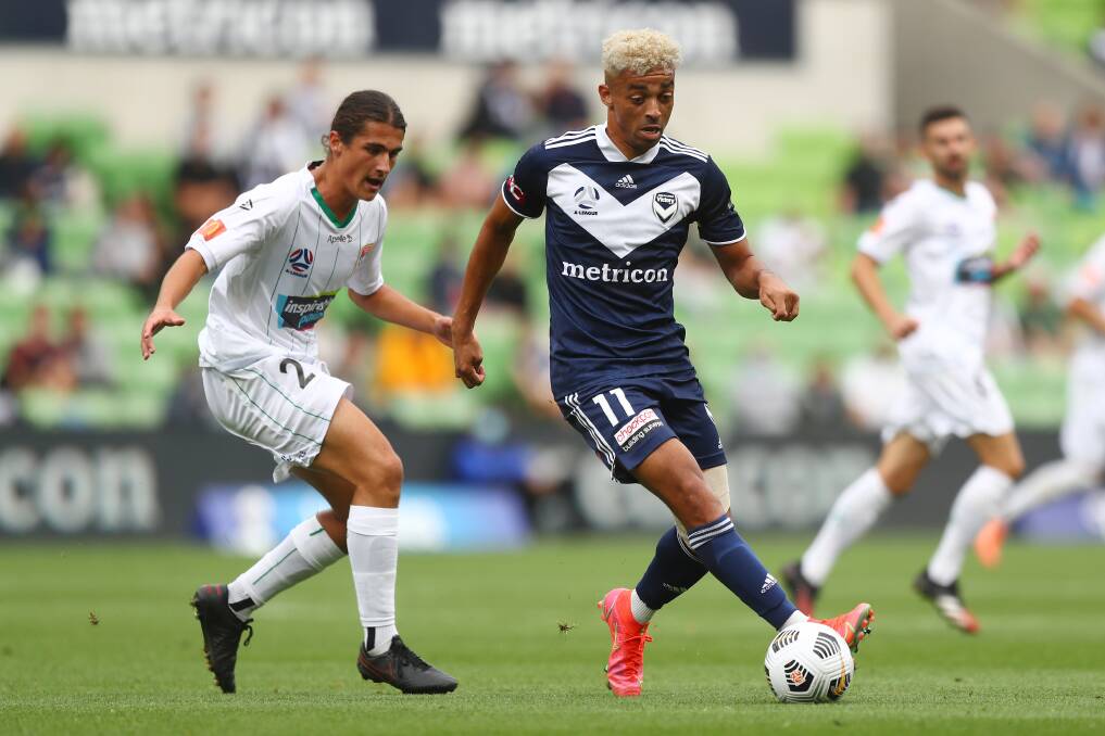 Archie Goodwin, left, in action during his A-League debut on Sunday. Picture: Getty Images