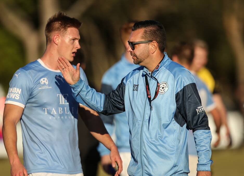 FOCUSED: Blues coach David Tanchevski, right, speaks with Jamie Byrnes during the 0-0 draw with Jaffas on Sunday. Picture: Marina Neil