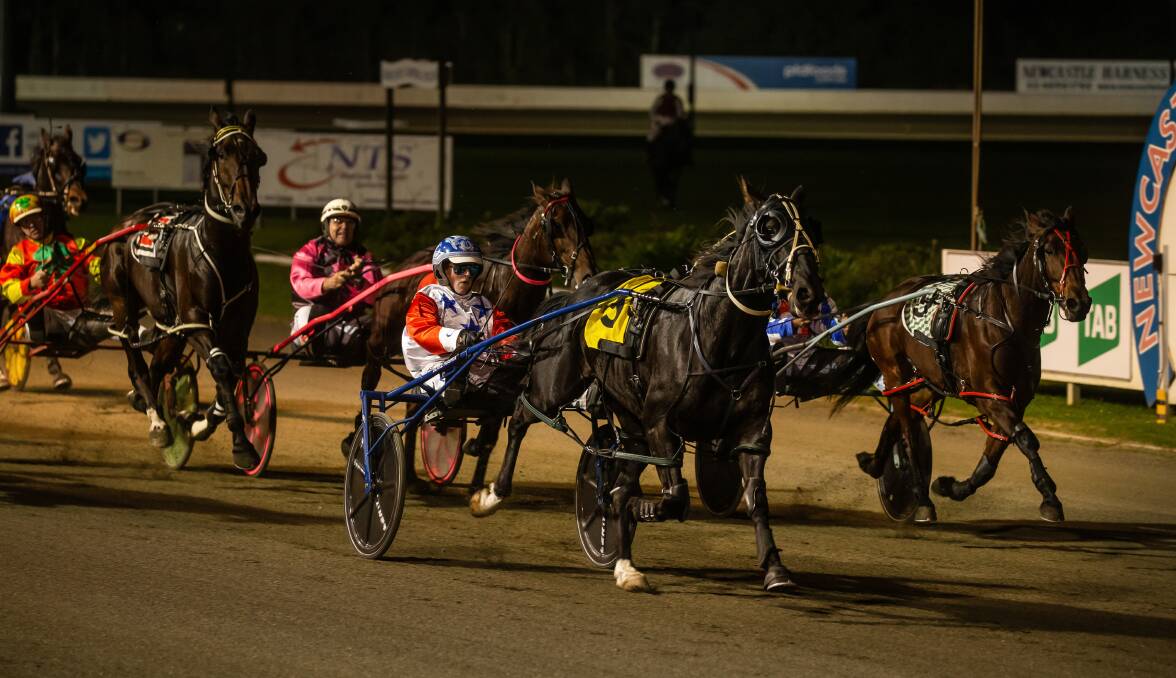 HOME: Blake Hughes takes Kanye Crusader, centre, to victory in heat two of the Regional Championships last Saturday night. Picture: Marina Neil