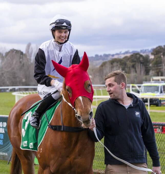 WINNING TEAM: Apprentice jockey Anna Roper and trainer Luke Pepper with Affinity Beyond after her victory on June 24 at Canberra. Picture: Keegan Carroll