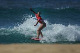 Bodhi Simon on her way to victory in the Surfest Indigenous Classic open women's final on Sunday at Merewether. Picture by Marina Neil