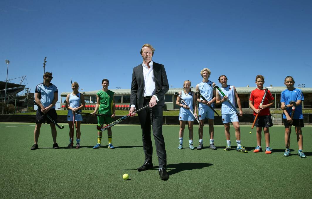 BRIGHT FUTURE: Newcastle International Hockey Centre development director Rolly de With and some of the Hunter's representative players on Wednesday. Picture: Marina Neil