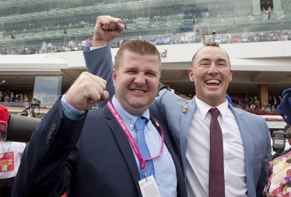 BACK FOR MORE: Australian Bloodstock founders and directors Luke Murrell and Jamie Lovett after Protectionist's victory in the 2014 Melbourne Cup.
