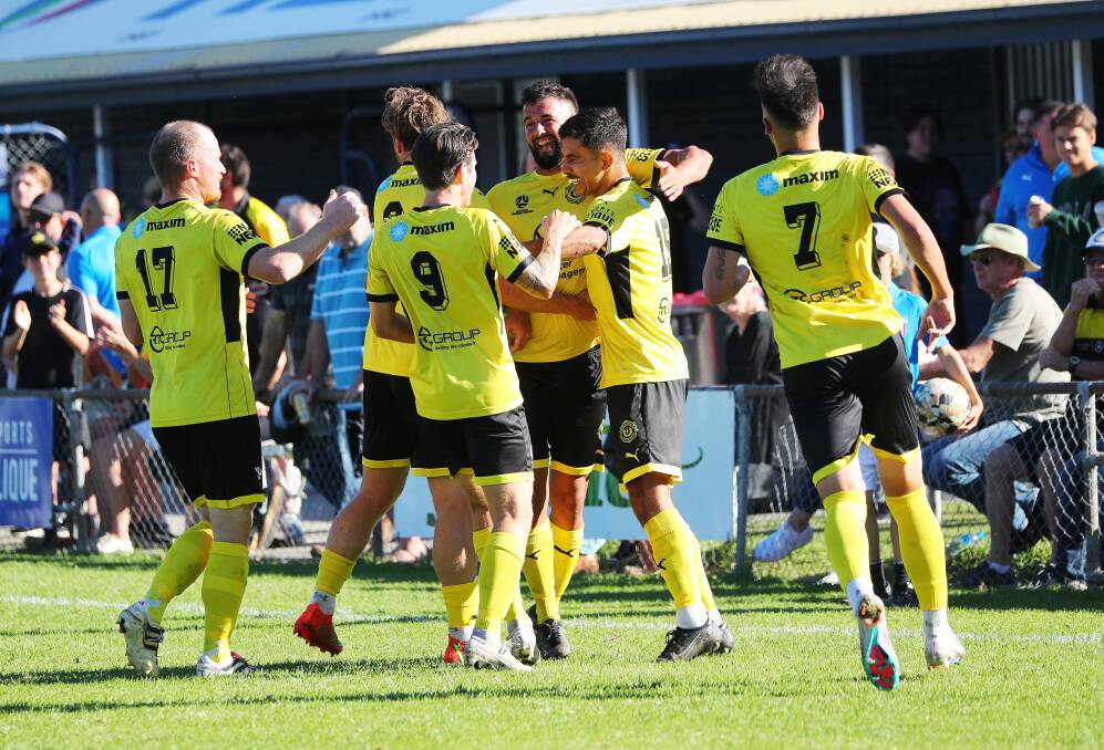 Lambton Jaffas celebrate Sam Webb's opening goal on Sunday against Charlestown at Lisle Carr Oval. Picture by Peter Lorimer