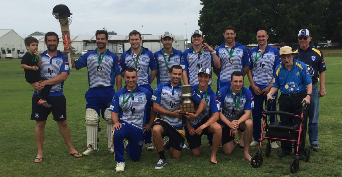 IN CONTROL: Hamilton-Wickham celebrate after their Tom Locker Cup final victory at Passmore Oval on Sunday.