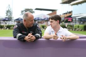 Westpac Rescue Helicopter first responder Glen Ramplin and injured jockey Lachlan Scorse catch up at Newcastle Racecourse on Saturday. Picture by Peter Lorimer