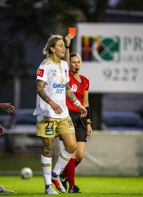 Larissa Crummer shown a red card against Perth on Saturday night. Picture: AAP/Tony McDonough