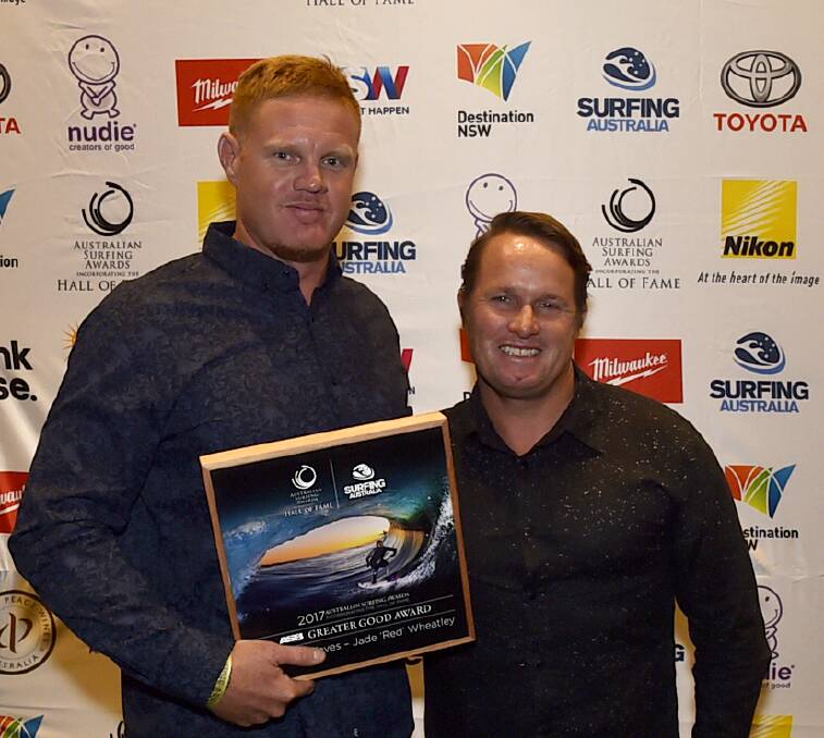 HONOURED: Jade "Red" Wheatley, left, with his award on Saturday night. Picture: Surfing Australia