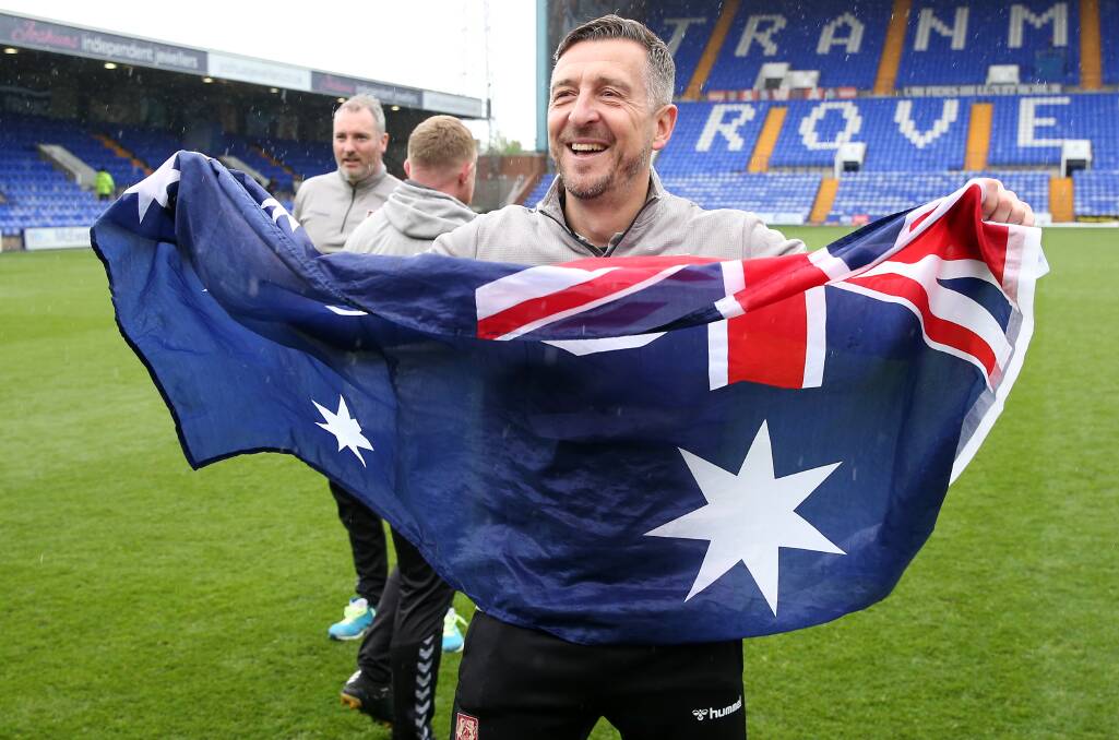 Jon Brady celebrates promotion. Picture by Barrington Coombs, PA/Getty Images.
